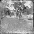 Two African American men and two African American boys probably on the property of Bayside Plantation, Pasquotank County, North Carolina
